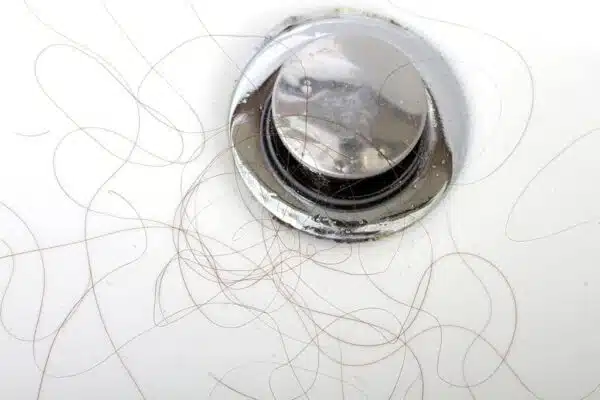 How To Avoid Hair Clogs And Other Common Drain Problems - Tioga Plumbing and Electric